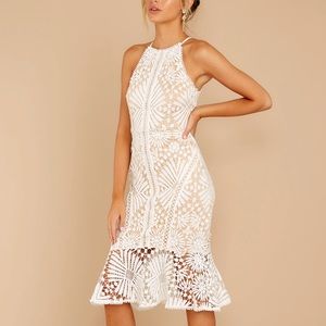 dressed in chic white lace midi dress